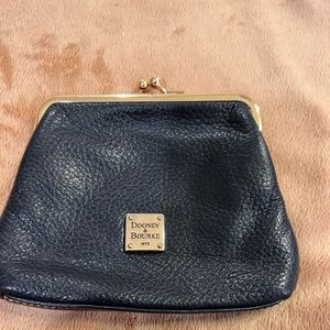 Dooney and Bourke snap wallet with card slots.  Dark color pebble leather
